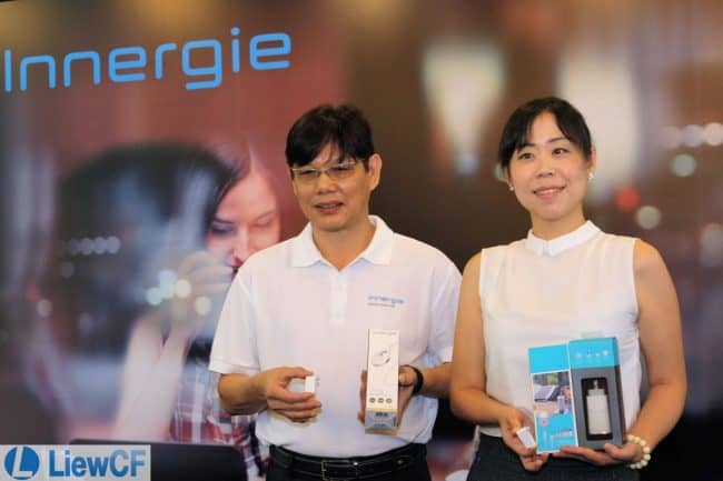 Ms Claire Wang (right), Global Director of Innergie Business and Mr Derrick Ho,Director of Innergie SEA together with Innergie's latest innovative charging solution PowerGear ICE 65 (travel adapter), WizardTip (attachable super-speed USB charging connector) and LifeHub Plus (a charging hub).